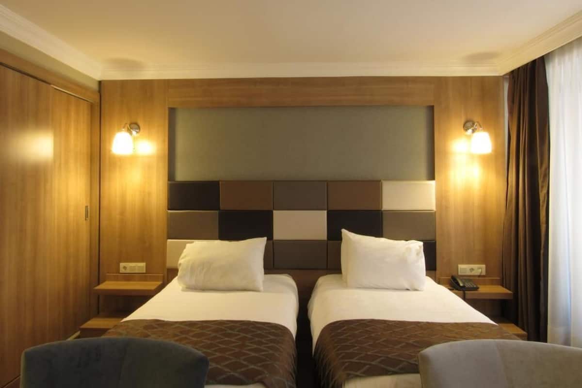 Superior Twin kamer | Luxe beddengoed, een minibar, een bureau, geluiddichte muren