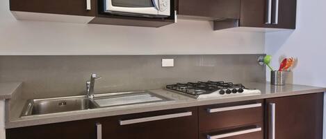 Apartment, 1 Bedroom | Private kitchen | Full-size fridge, stovetop, electric kettle, toaster