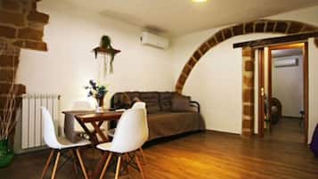 Appartamento Design | Area soggiorno | TV 24 pollici con canali digitali