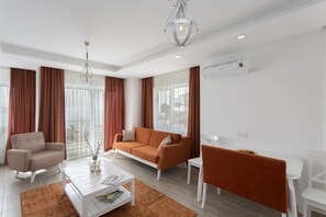Apartment, 3 Bedrooms | Living room | 102-inch flat-screen TV with satellite channels, TV - Kybele Suits (Kas)