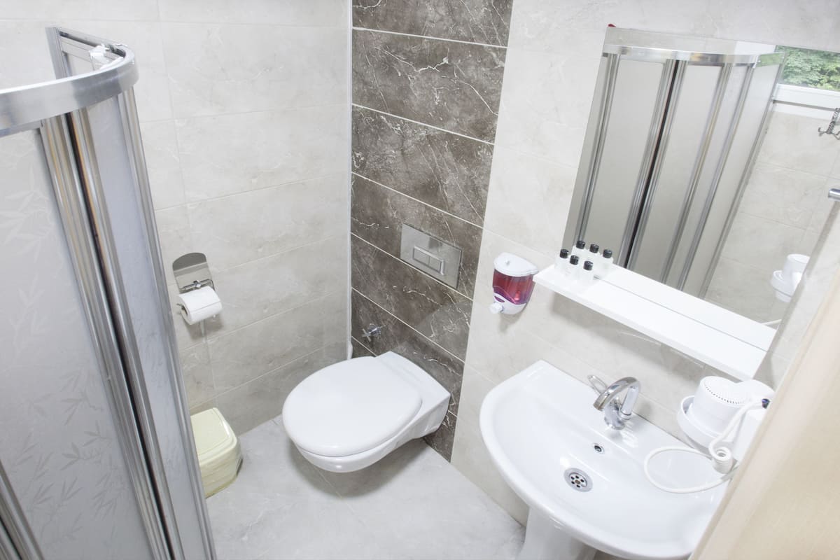 family room, 2 bedrooms, connecting rooms, valley view | bathroom | shower, free toiletries, hair dryer, slippers