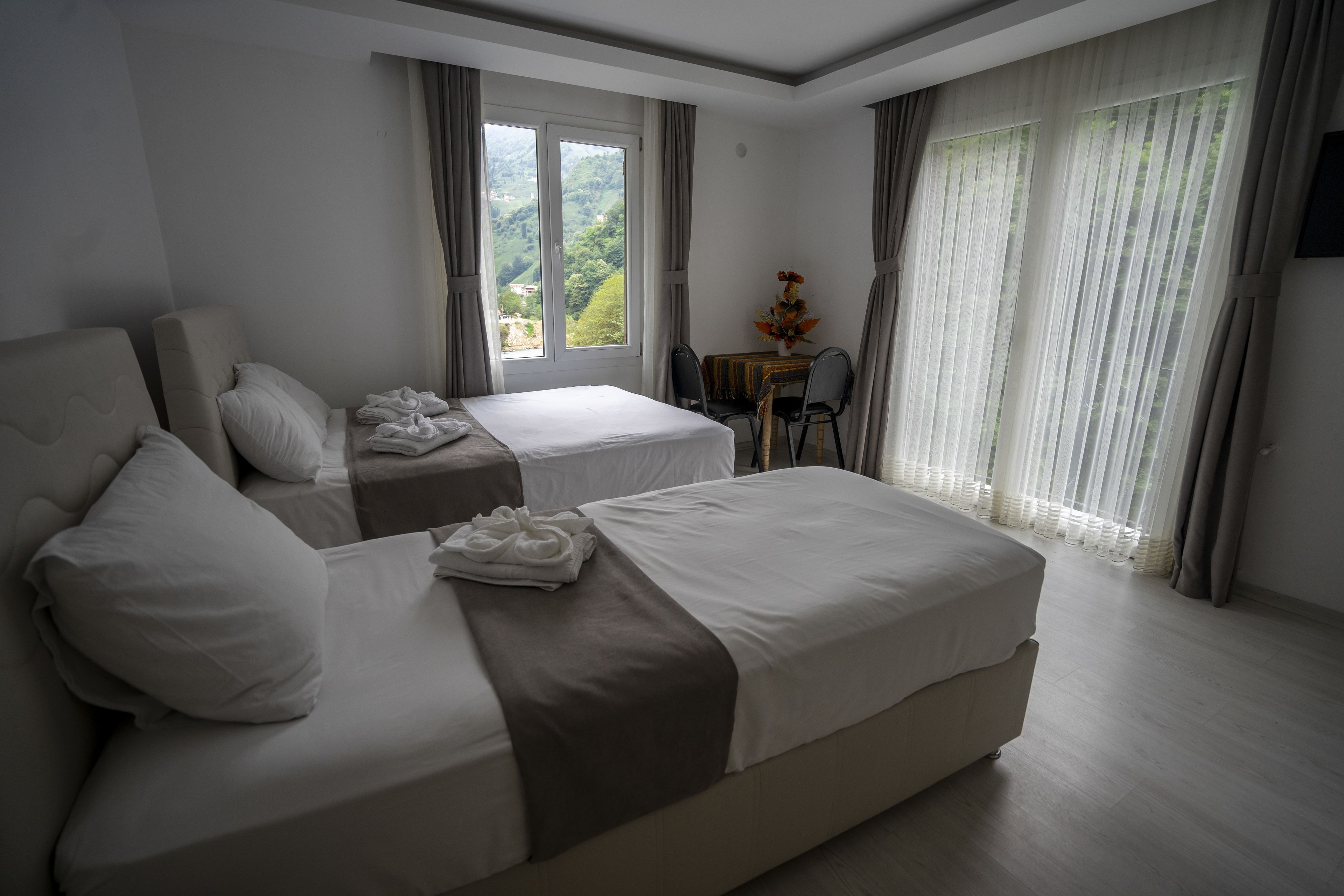 family room, 2 bedrooms, connecting rooms, valley view | desk, blackout curtains, soundproofing, free wifi