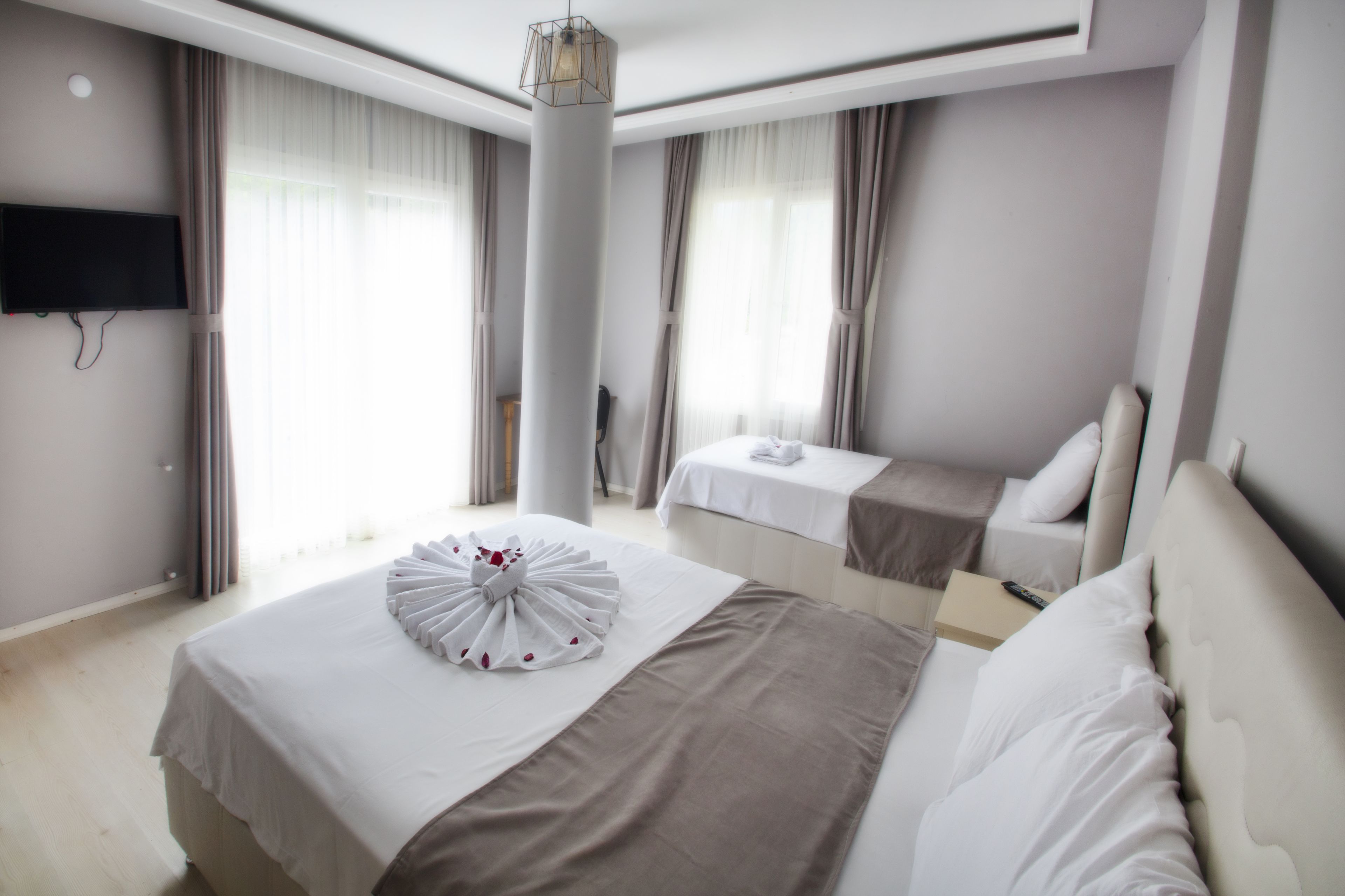 family triple room, mountain view | desk, blackout curtains, soundproofing, free wifi