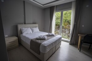 Economy Double Room, Mountain View | Desk, blackout drapes, soundproofing, free WiFi