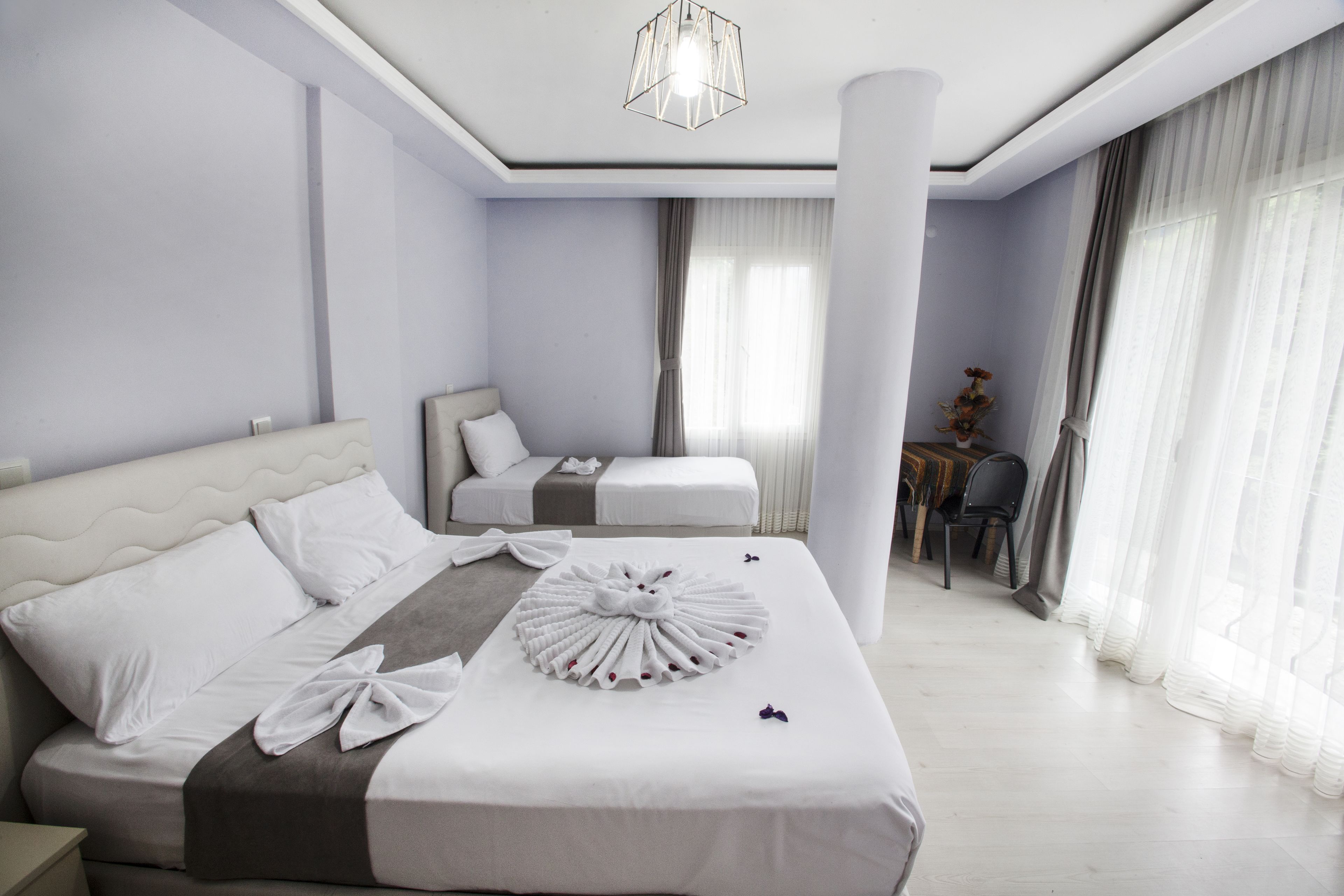 family triple room, mountain view | desk, blackout curtains, soundproofing, free wifi