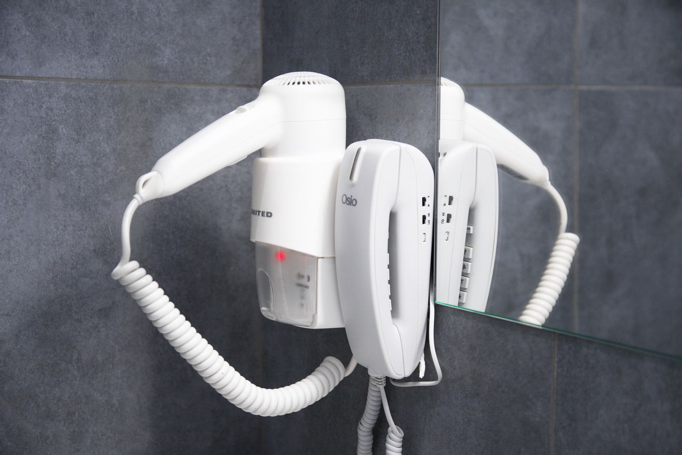 deep-soaking bathtub, eco-friendly toiletries, hair dryer, towels