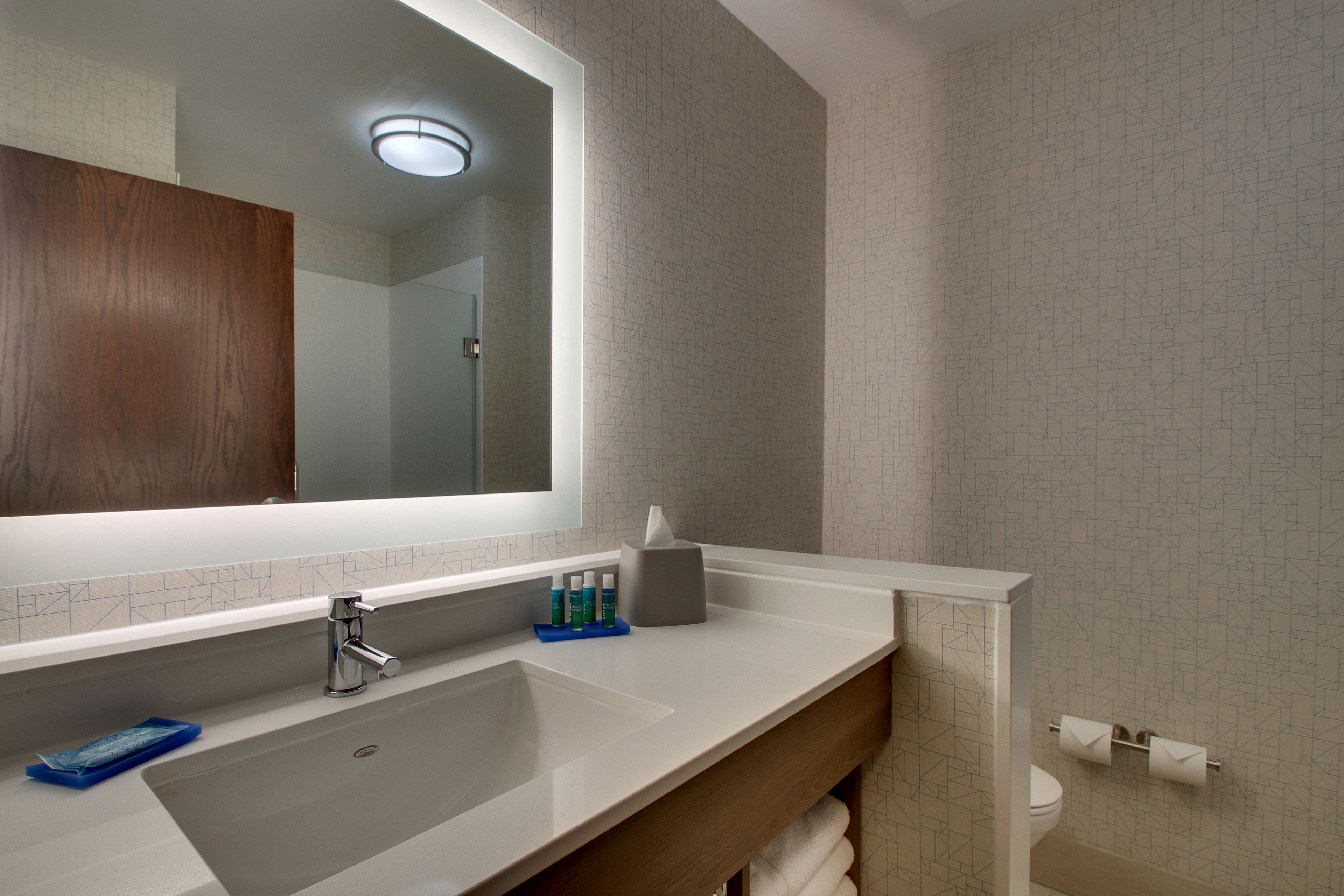 spring water bathtub, rainfall showerhead, free toiletries, hair dryer