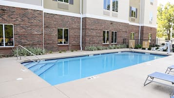Seasonal outdoor pool, open 8 AM to 10 PM, pool umbrellas, pool loungers