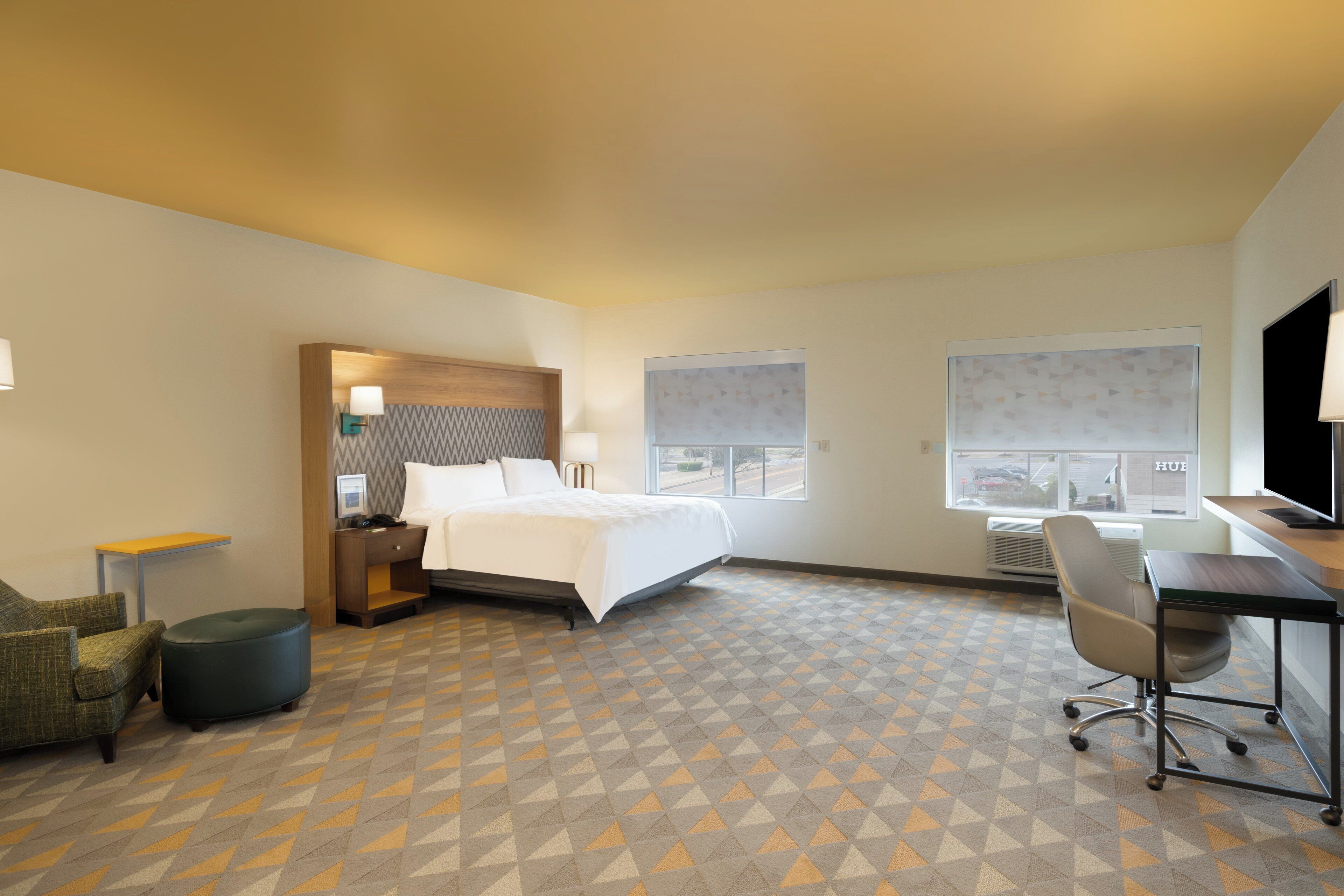 Premium bedding, pillow-top beds, desk, blackout curtains