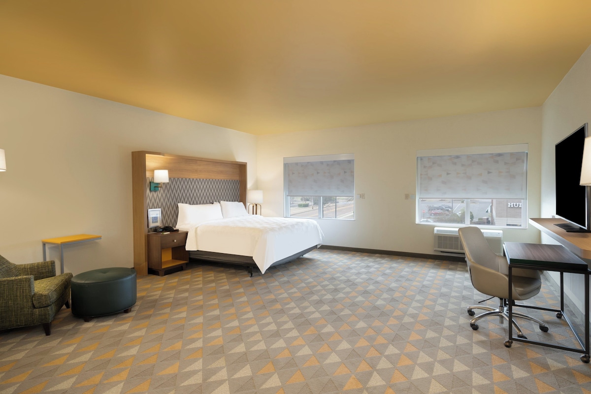 Premium bedding, pillow-top beds, desk, blackout curtains