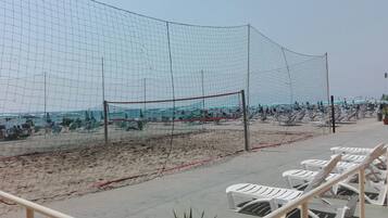 On the beach, white sand