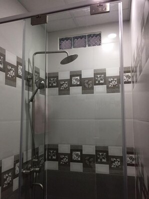 Shower, free toiletries, hair dryer, slippers