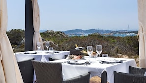 Breakfast, lunch served; Mediterranean cuisine, golf course views