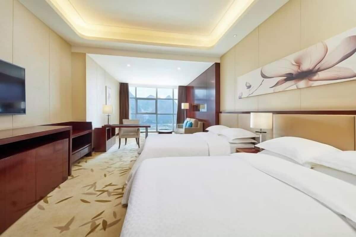 Premium bedding, down duvets, pillow-top beds, minibar