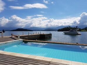 Outdoor pool, pool umbrellas, sun loungers