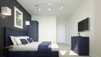 A modern bedroom with a bed, bedside tables, a wardrobe, a television, and a framed picture on the wall.