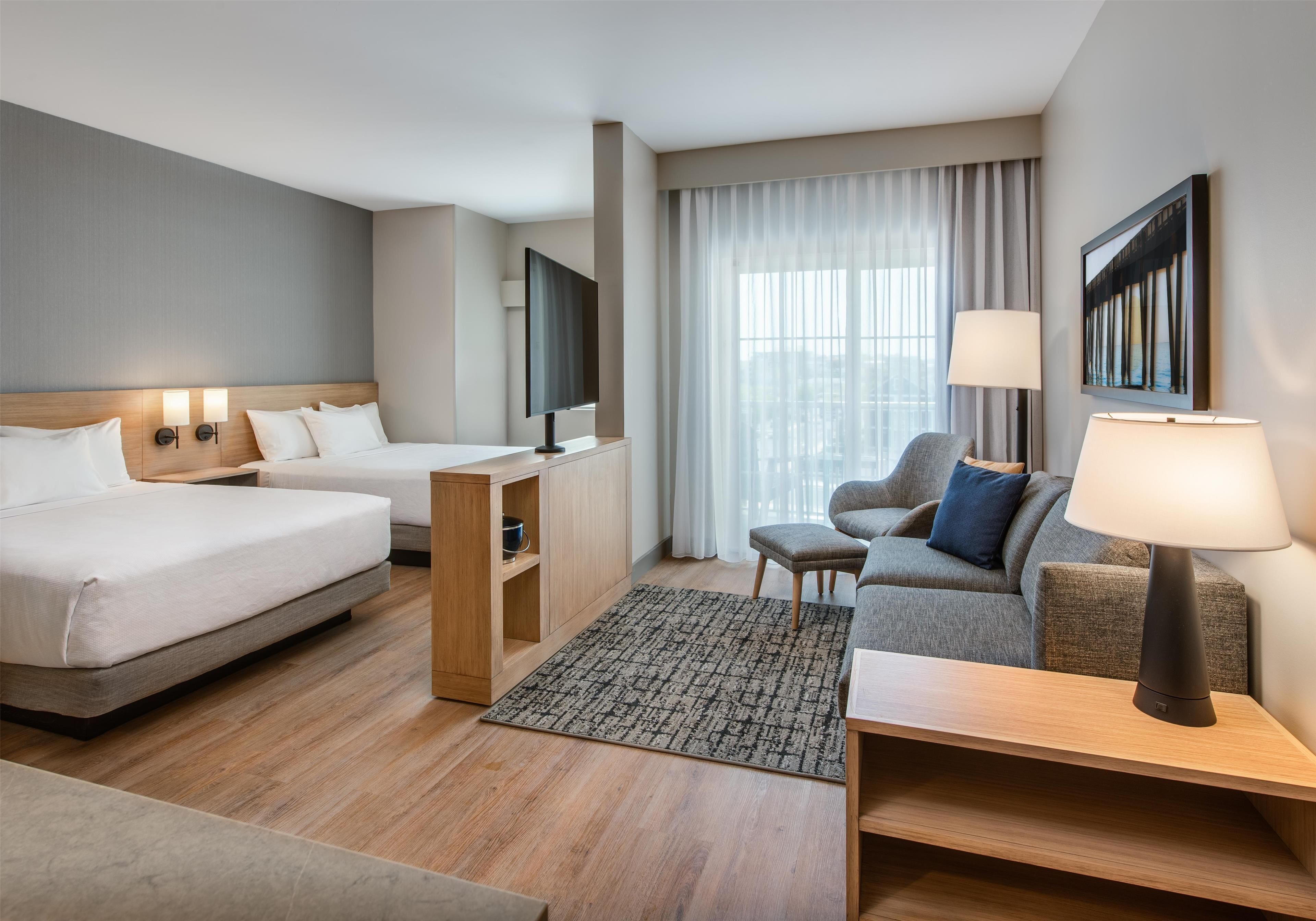 studio suite, city view (2 queen beds) | premium bedding, down duvets, pillow-top beds, in-room safe