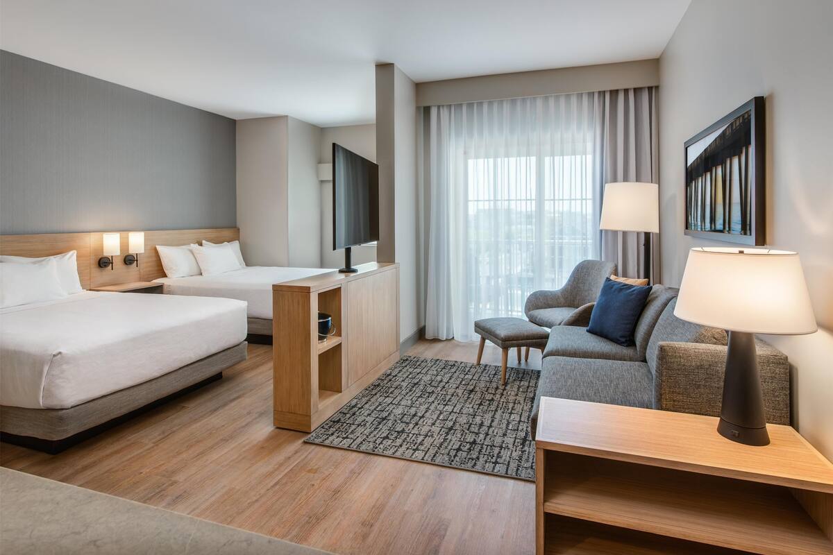 studio suite, city view (2 queen beds) | premium bedding, down duvets, pillow-top beds, in-room safe