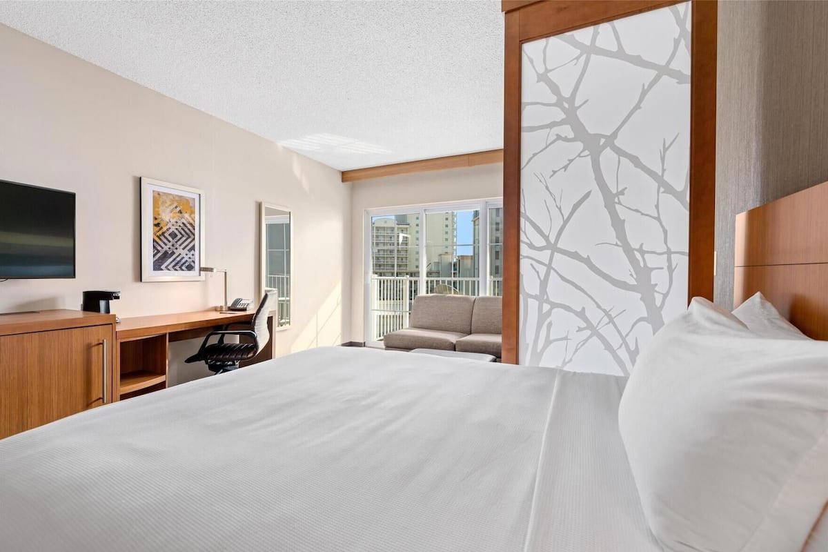 Premium bedding, down duvets, pillow-top beds, in-room safe