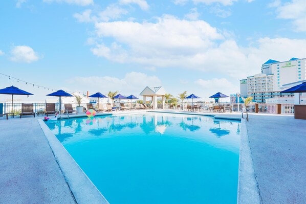 Indoor pool, seasonal outdoor pool, pool umbrellas, sun loungers
