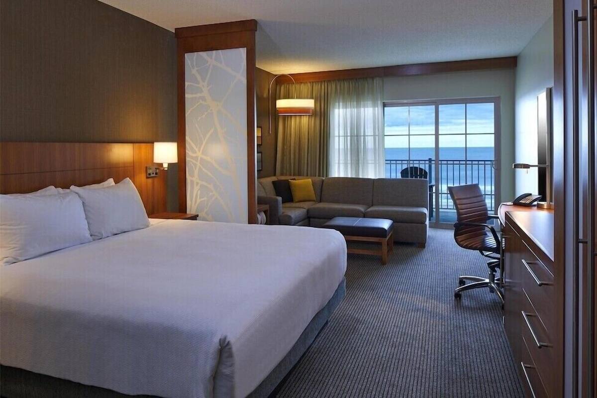 Premium bedding, down comforters, pillowtop beds, in-room safe
