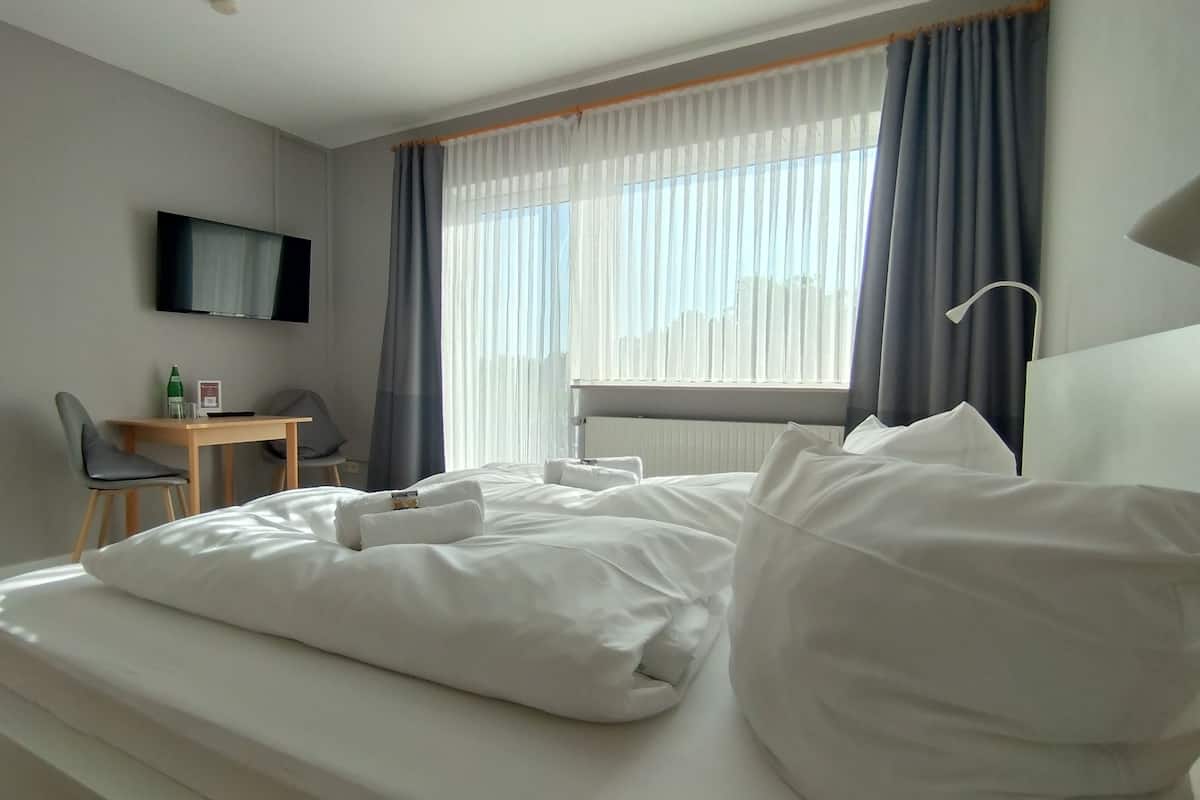 Chambre Double Classique, 1 trĂšs grand lit