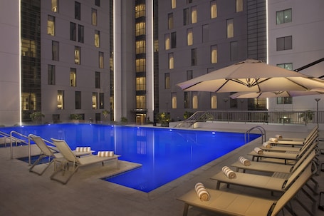 Outdoor pool. Hampton by Hilton Dubai Airport
