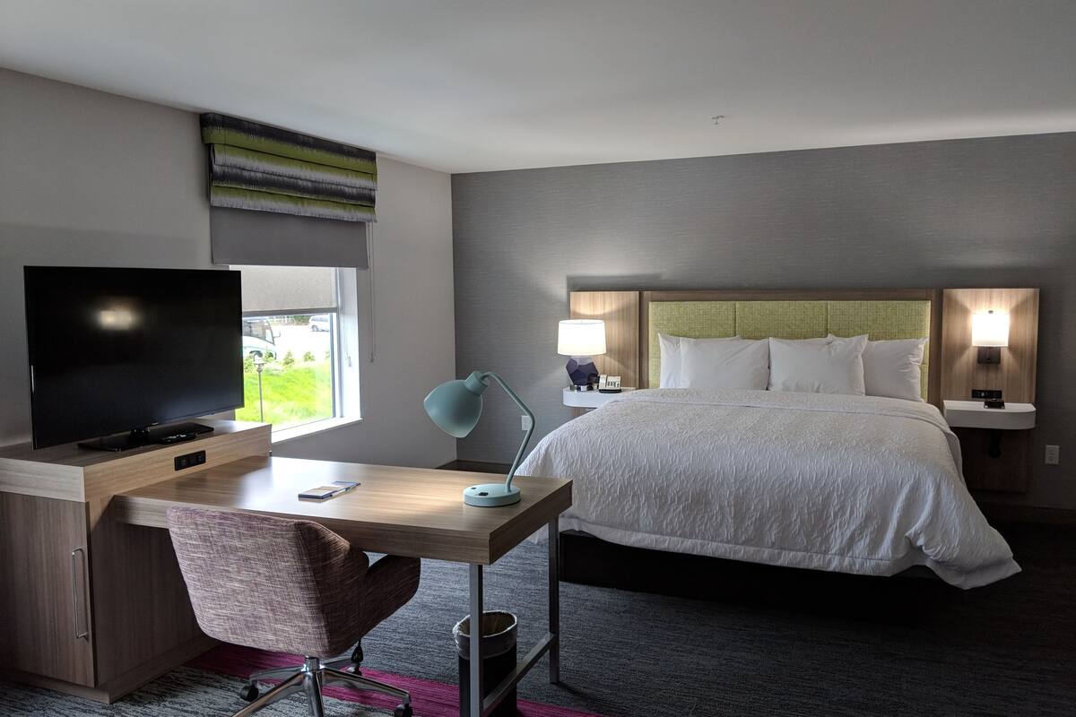 studio, 1 king bed, refrigerator & microwave (wet bar) | laptop workspace, blackout curtains, free wifi