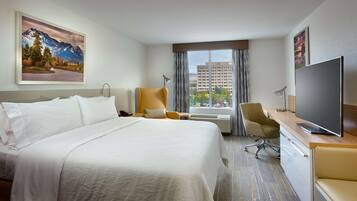 Desk, laptop workspace, blackout drapes, iron/ironing board