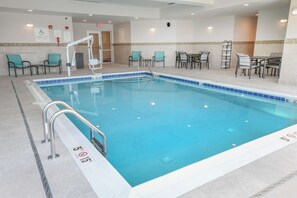 Indoor pool, open 6:00 AM to 10:00 PM, pool loungers