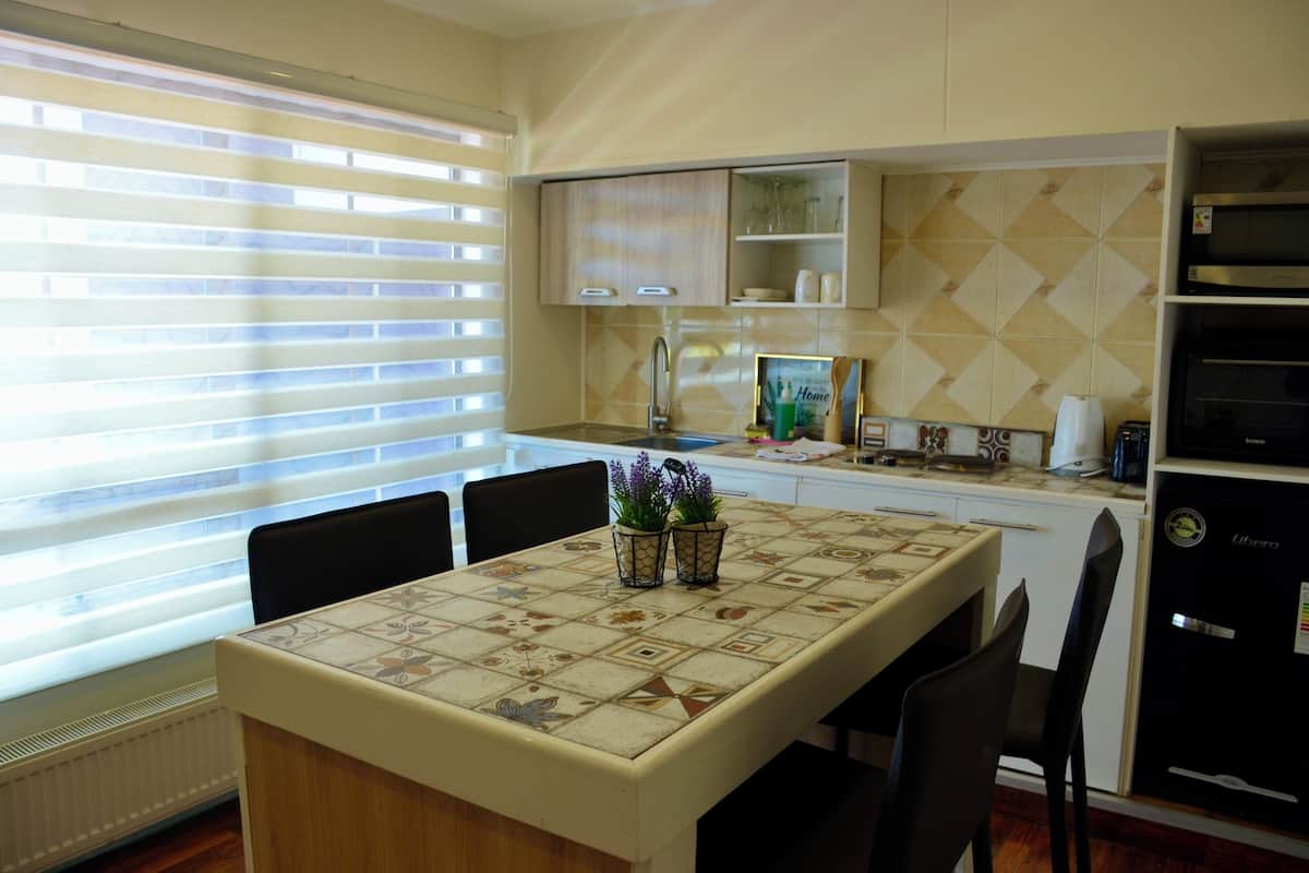 Executive Apartment, 1 Bedroom | Living area | 42-inch flat-screen TV with cable channels, TV