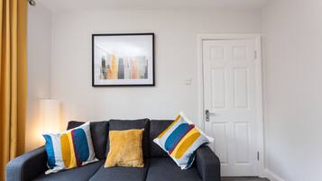 Luxury Double Room Single Use, 2 Twin Beds | Living area | Flat-screen TV