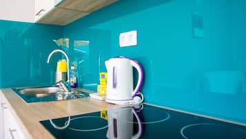 Apartment, Terrace (Sunny) | Private kitchen | Fridge, coffee/tea maker, electric kettle, highchair