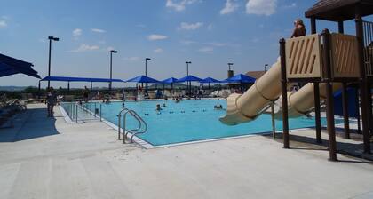 Unwind at High Ridge: Hot Tub Nights, Arcade Lights & Fire Pit Fun!