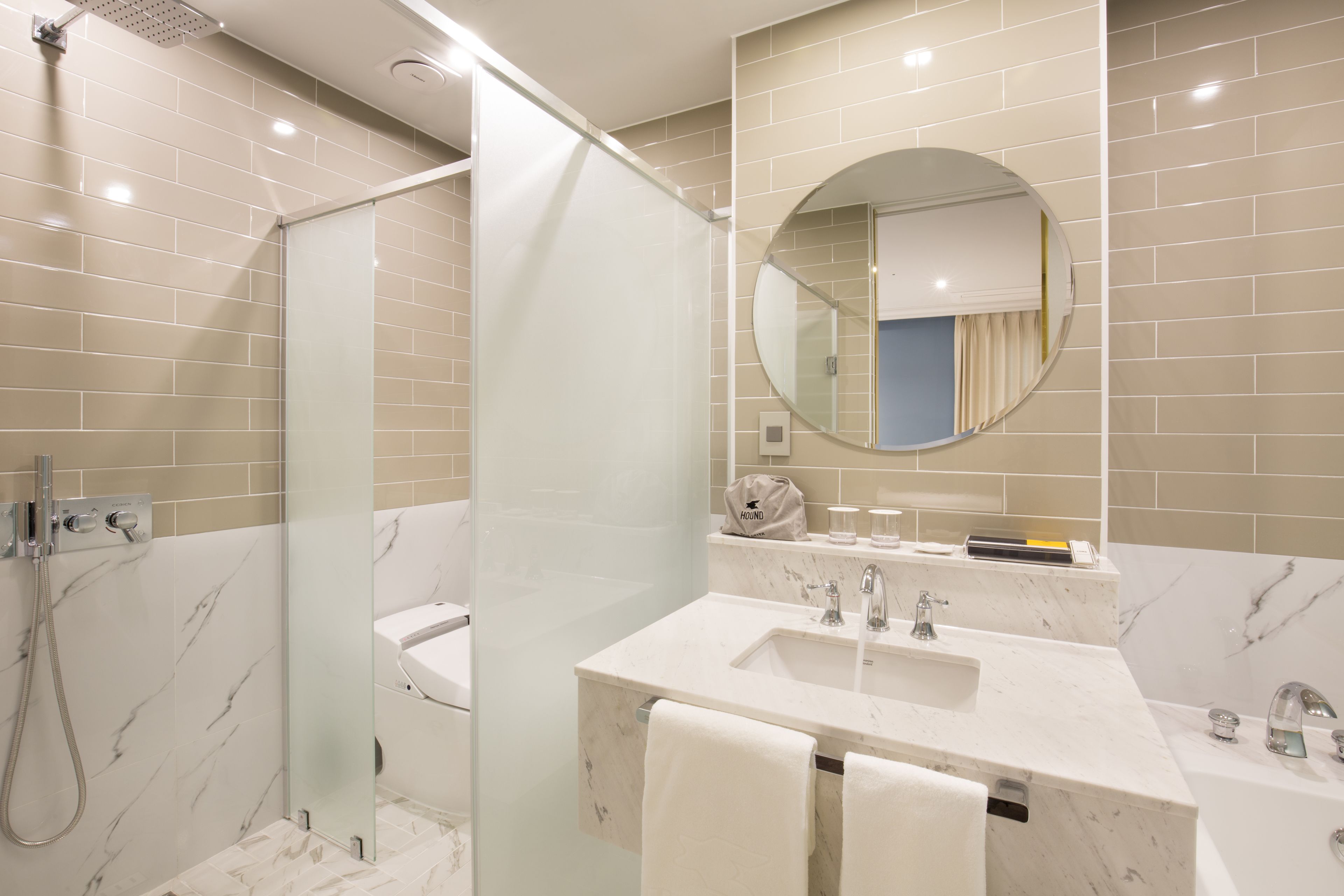 separate bathtub and shower, deep-soaking bathtub, rainfall showerhead