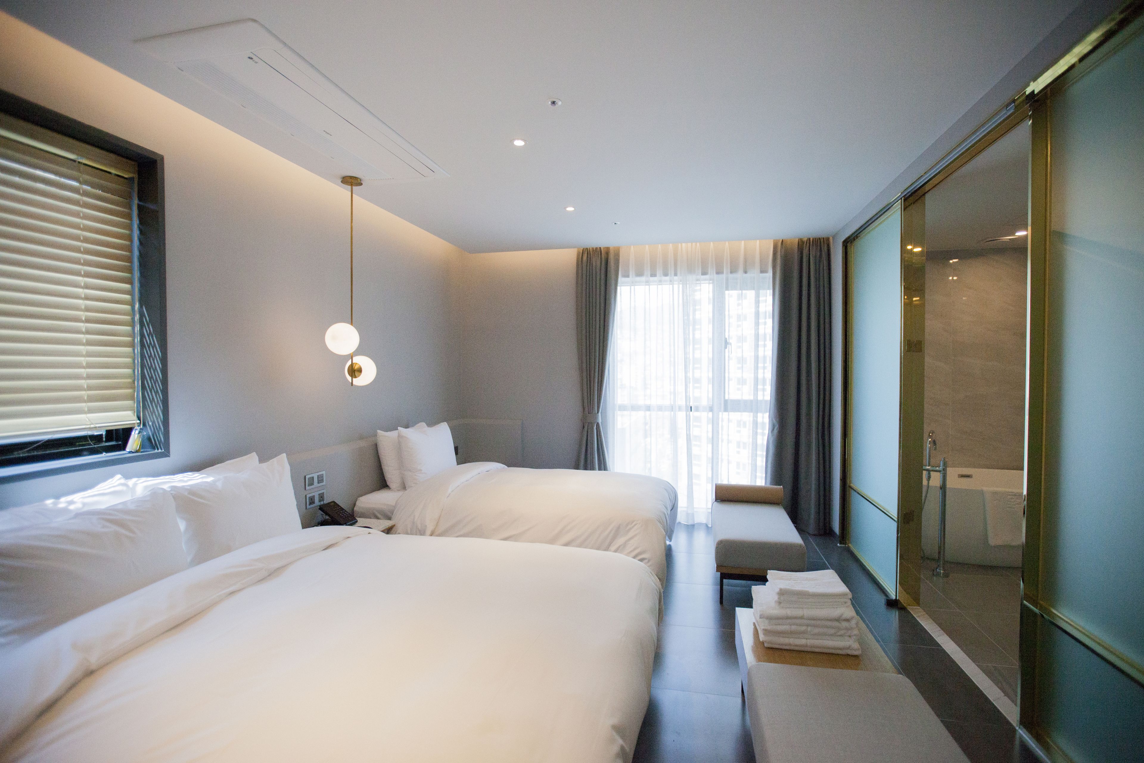 family twin room, city view | premium bedding, in-room safe, desk, blackout curtains