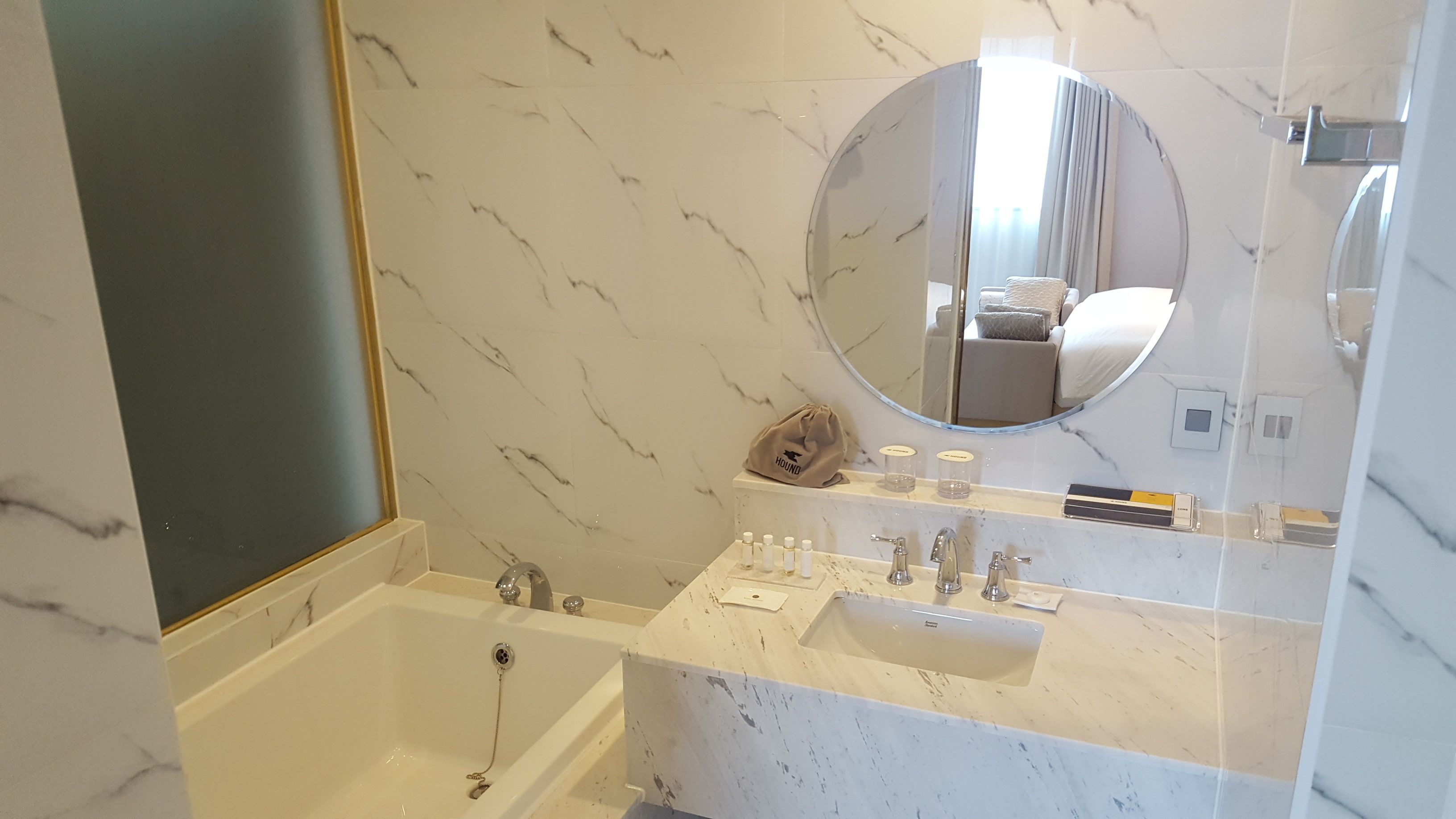 separate bathtub and shower, deep-soaking bathtub, rainfall showerhead