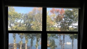 A window with a view of a lake and trees. - Shorely Heaven:  WiFi, Disney+, Amazon Prime, YouTubeTV, (2) Kayaks Wide Water Lake Views (Moneta)