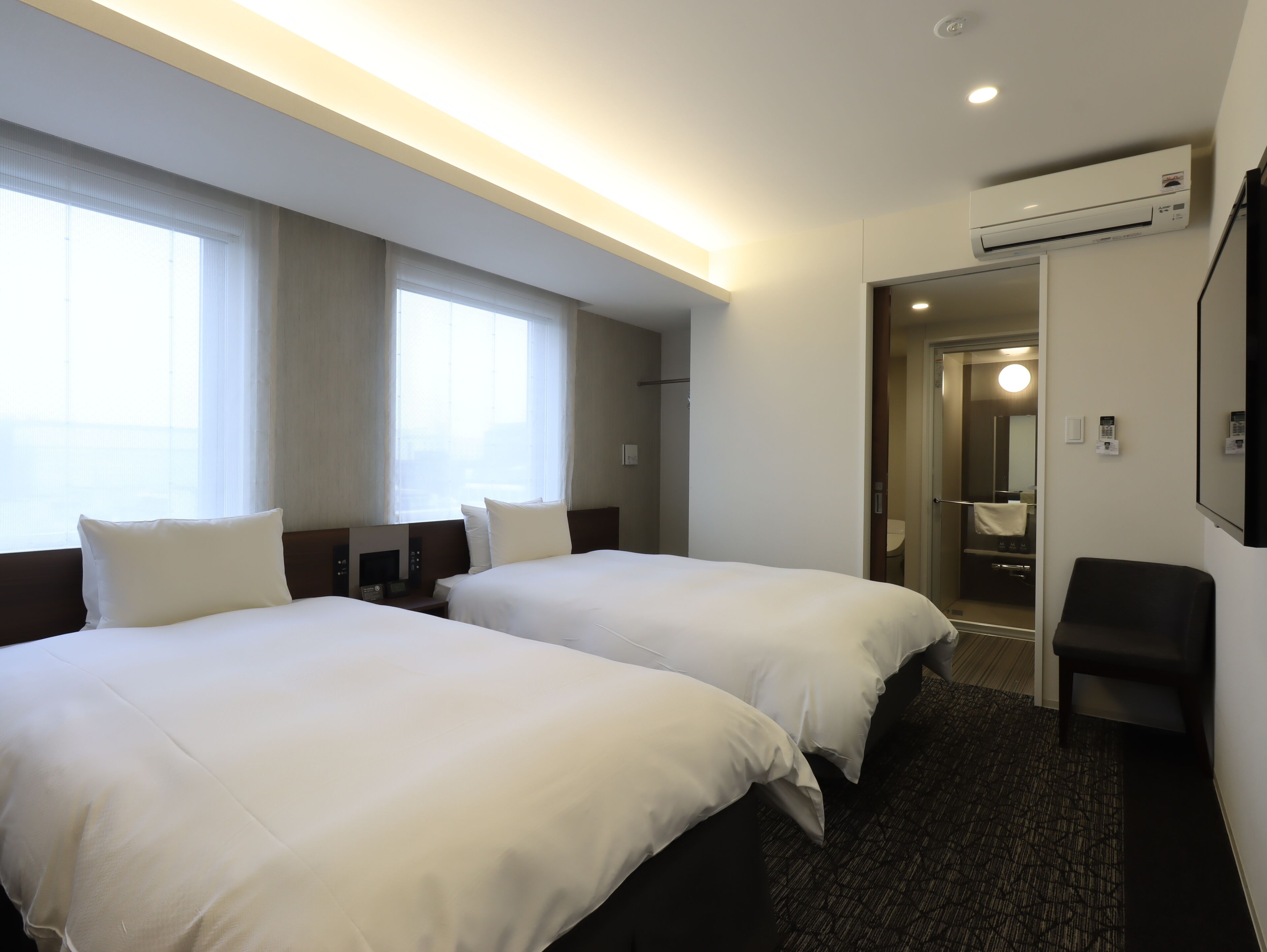 deluxe twin room | 1 bedroom, in-room safe, blackout curtains, iron/ironing board