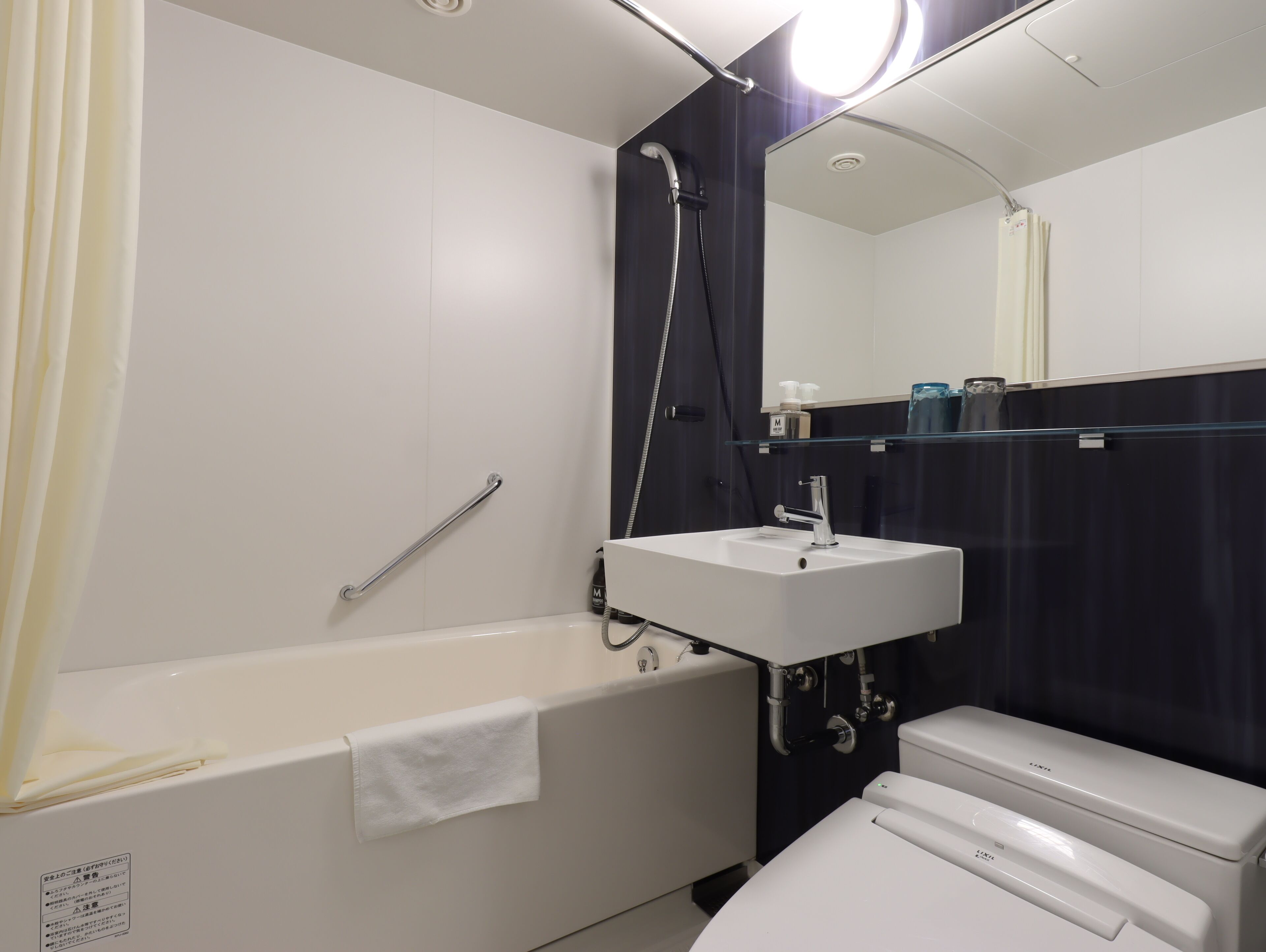 twin room | bathroom | free toiletries, hair dryer, slippers, bidet