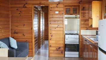 Oceanside Bungalow | Living area | Flat-screen TV, DVD player