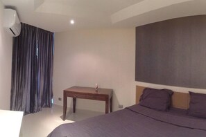 1 Bedroom with Pool View | 1 bedroom, minibar, in-room safe, desk