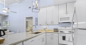 Fridge, microwave, oven, stovetop - Gulf Getaway – Beach Castle #12 by RVA (Longboat Key)