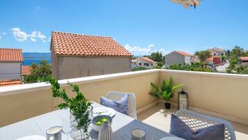 Apartamento familiar, vistas al mar | Terraza o patio