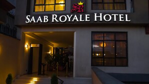 The exterior of the Saab Royale Hotel with a prominent entrance and a sign displaying the hotel name. - Saab Royale Hotel (Nairobi)