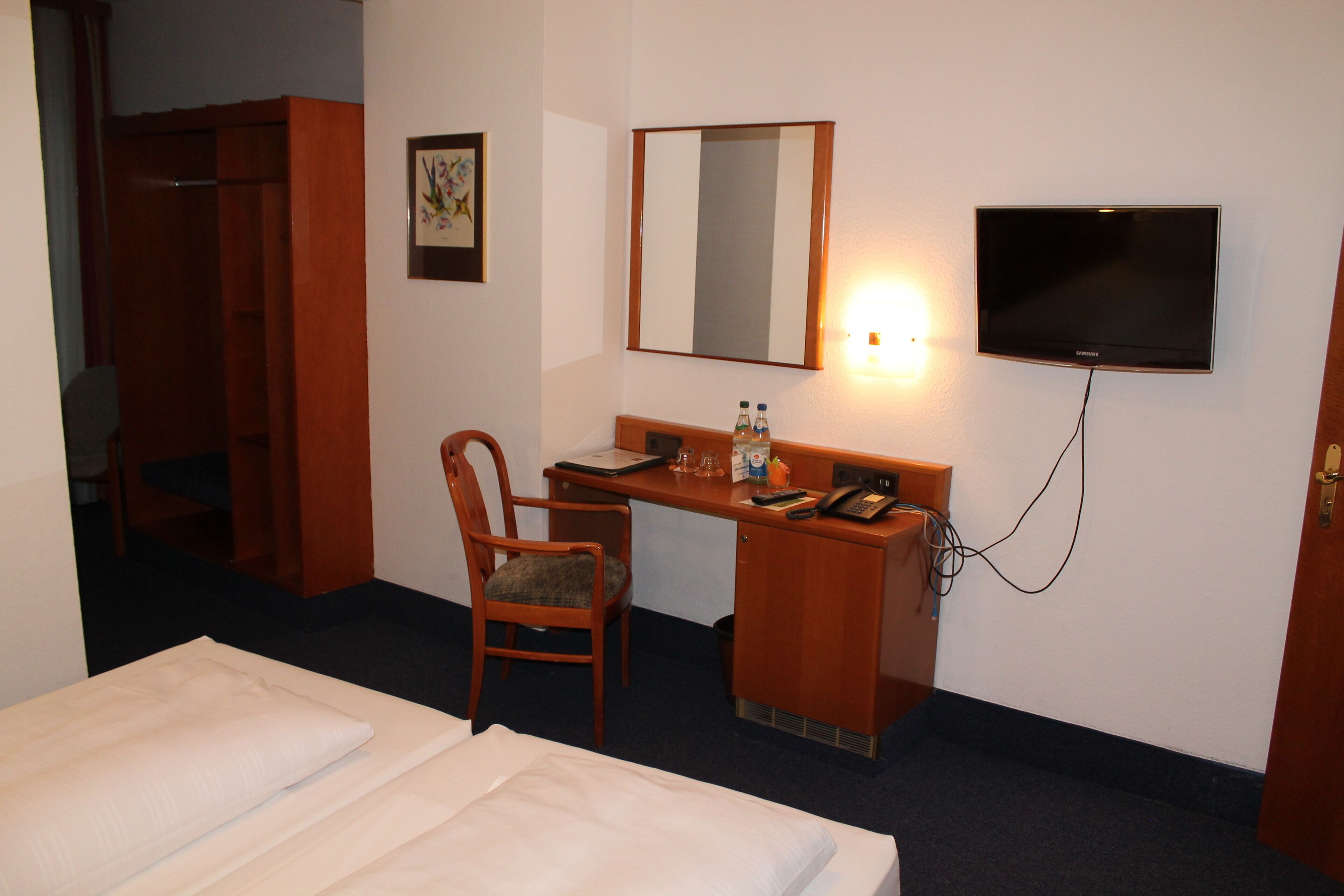 standard double room | living area | flat-screen tv