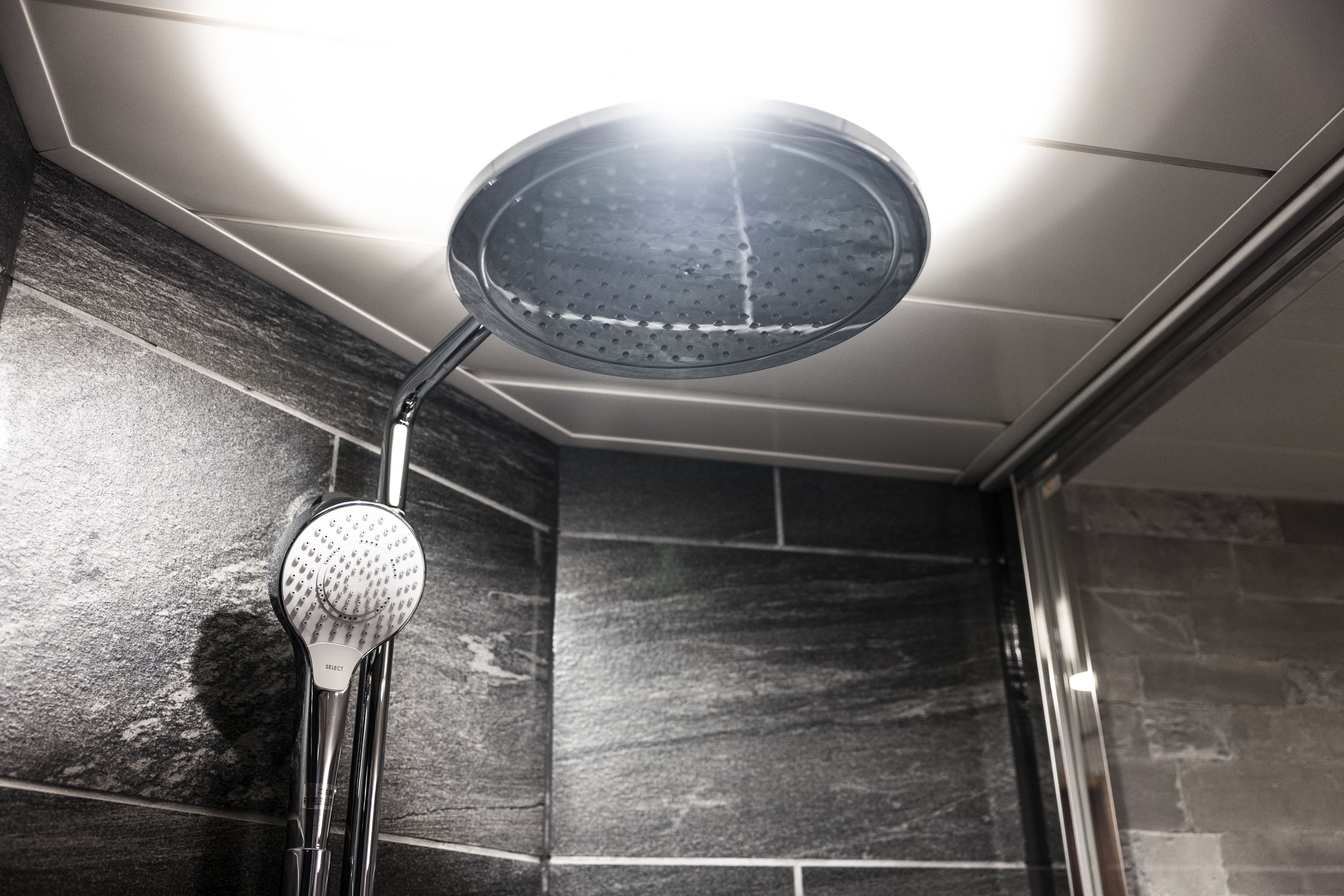 standard double room, 1 queen bed | bathroom shower