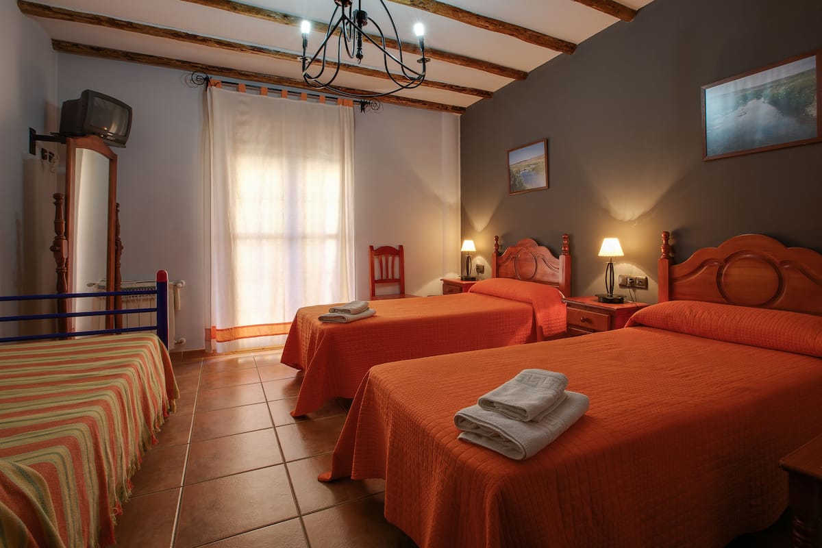 Traditional Triple Room, Balcony | Individually decorated, individually furnished, blackout drapes