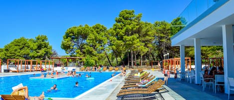 Seasonal outdoor pool, pool umbrellas, pool loungers