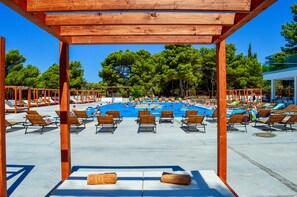 Seasonal outdoor pool, pool umbrellas, pool loungers